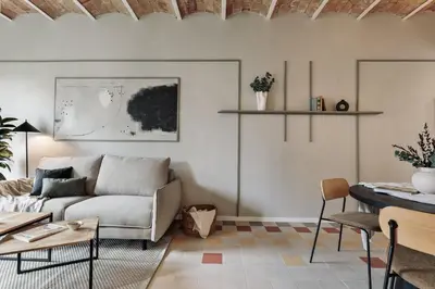 a bathroom with a toilet and a sink and a shower at Pollock - 2 bedrooms and office in Eixample Dreta in Barcelona