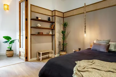 a living room with a couch and a table at Padar - 2 bedrooms in Eixample Dreta in Barcelona