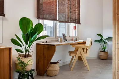 a bathroom with a sink and a toilet and a mirror at Padar - 2 bedrooms in Eixample Dreta in Barcelona