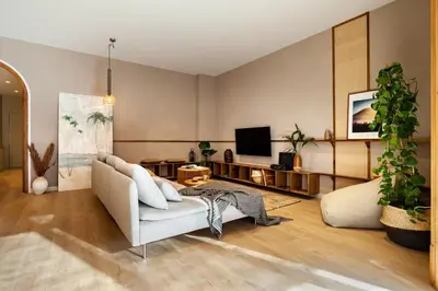 a living room with a couch and a table at Padar - 2 bedrooms in Eixample Dreta in Barcelona