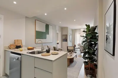 a living room with a couch and a table at Chulamar - 2 bedrooms and balcony in Sant Gervasi in Barcelona