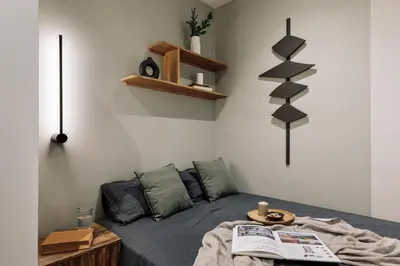 a kitchen with white cabinets and a silver refrigerator at Chulamar - 2 bedrooms and balcony in Sant Gervasi in Barcelona