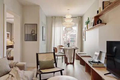 a bedroom with a bed with a tray on it at Chulamar - 2 bedrooms and balcony in Sant Gervasi in Barcelona