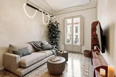 a bathroom with a shower and a toilet and a sink at Lluna - 2 Bedrooms and office in Gracia in Barcelona