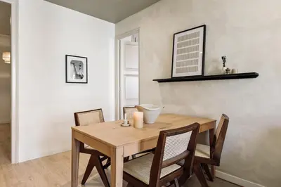 a bedroom with a bed with a tray on it at Lluna - 2 Bedrooms and office in Gracia in Barcelona