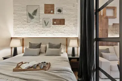 a kitchen with a sink and a stove top oven at Aleu - 2 bedrooms and balcony in Sagrada Família in Barcelona