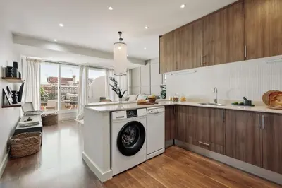 a bathroom with a toilet and a sink and a shower at Neu - 2 bedrooms and terrace in Eixample Esquerra in Barcelona