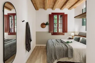 a living room with a couch and a table at Cadaques - 1 bedroom and balcony in Sant Antoni in Barcelona