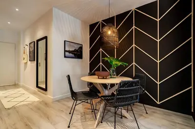a hallway with a white door in a room at Quena - 2 bedrooms and balcony in Eixample Dreta in Barcelona