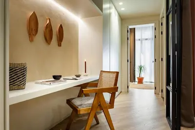 a living room with a couch and a table at Siwa - 2 bedrooms in Eixample Dreta in Barcelona