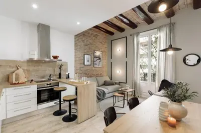 a wall with a shelf with items on it at Espriu - 2 bedrooms and balcony in Sant Antoni in Barcelona