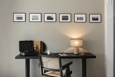 a kitchen and living room with a table and chairs at NIVE - 3 bedrooms apartment in Sant Gervasi in Barcelona