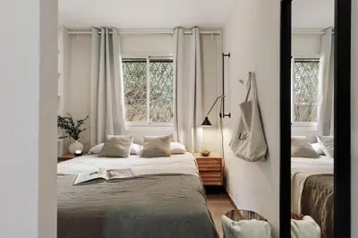 a kitchen with a washing machine and a window at Cadi - 1 bedroom apartment in Sant Gervasi in Barcelona