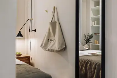 a bedroom with a bed and a large mirror at Cadi - 1 bedroom apartment in Sant Gervasi in Barcelona