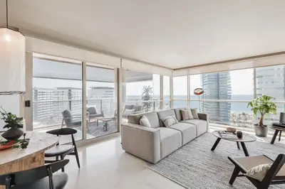 a bedroom with a bed and a large window at Pavots - 3 bedrooms, pool and gym in Poblenou in Barcelona