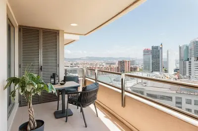 a gym with a row of treadmills and ellipticals at Pavots - 3 bedrooms, pool and gym in Poblenou in Barcelona