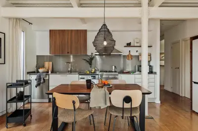 a living room with a couch and a table at Taksim - 2 bedrooms and balcony in La Barceloneta in Barcelona