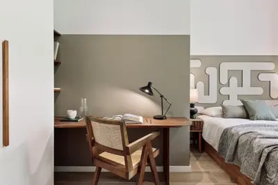 a bedroom with a large bed and a desk at Aire - 1 bedroom and balcony in Sant Antoni in Barcelona