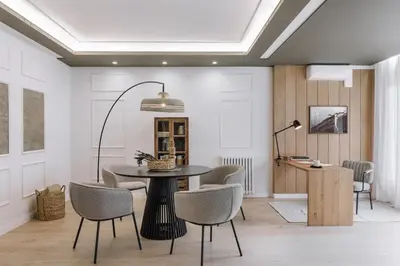 a living room with a couch and a table at Aran - 3 bedrooms in Eixample Esquerra in Barcelona