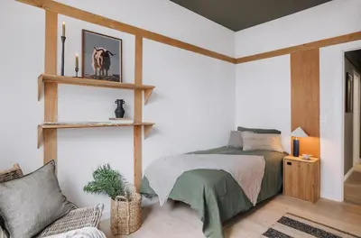 a bedroom with a bed and a chair at Aran - 3 bedrooms in Eixample Esquerra in Barcelona