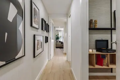 a dining room with a table and a mirror at Basquiat - 2 bedrooms and office in Sant Gervasi in Barcelona