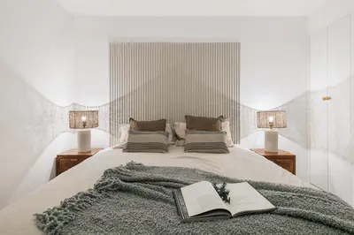 a bathroom with a shower and a toilet and a sink at Equense - 2 bedrooms in Sant Gervasi in Barcelona
