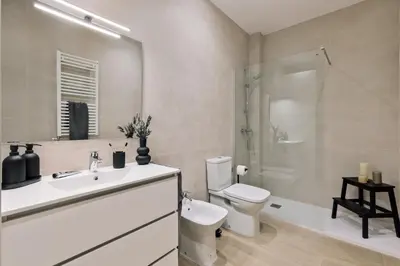 a bedroom with a bed in a room at Incahuasi - 3 bedrooms and terrace in Eixample Esquerra in Barcelona