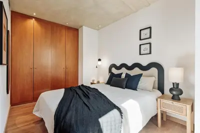 a kitchen with white cabinets and a sink at Miro - 1 bedroom in El Born in Barcelona