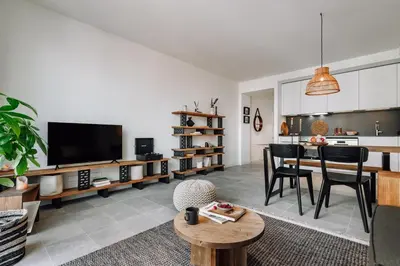 a bedroom with a bed with a tray on it at Olite - 2 bedrooms in Eixample Esquerra in Barcelona