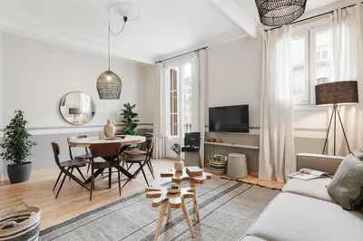 a bedroom with a bed with a tray on it at Mourene - 3 bedrooms in Eixample Dreta in Barcelona