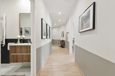 a bedroom with a large bed with two books on it at Mourene - 3 bedrooms in Eixample Dreta in Barcelona
