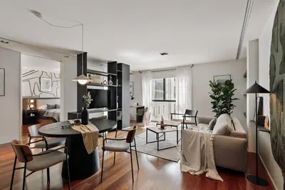 a bedroom with a bed and a large mirror at Lewitt - 1 bedroom in Eixample Dreta in Barcelona