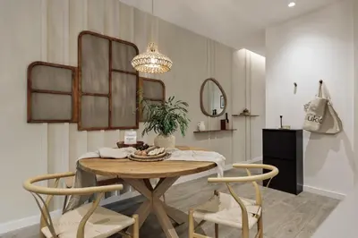 a small table on a balcony with two chairs at Caris - 2 bedrooms and balcony in Les Corts in Barcelona