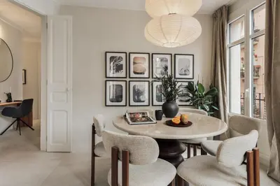 a bedroom with a bed with a large headboard at Zafiro - 3 bedrooms and balcony in Sants in Barcelona