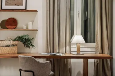 a dining room table with a bowl of fruit on it at Halea - 3 bedrooms w/ terrace in Eixample Esquerra in Barcelona