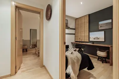 a kitchen with a washing machine and a stove at Etosha - 3 bedrooms and balcony in Eixample Dreta in Barcelona