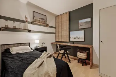a room with a table with a bowl of fruit on it at Etosha - 3 bedrooms and balcony in Eixample Dreta in Barcelona