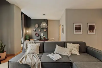 a bedroom with a bed with a book on it at Etosha - 3 bedrooms and balcony in Eixample Dreta in Barcelona