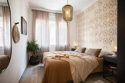a bedroom with a large bed in a room at Adigrat - 3 bedrooms in Gràcia in Barcelona