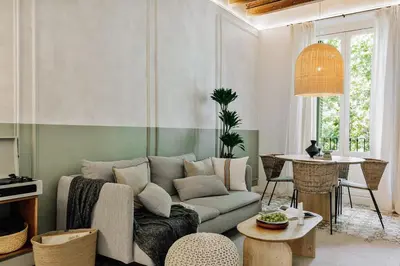 a bathroom with a toilet and a glass shower at Scala - 2 bedrooms in Sant Gervasi in Barcelona