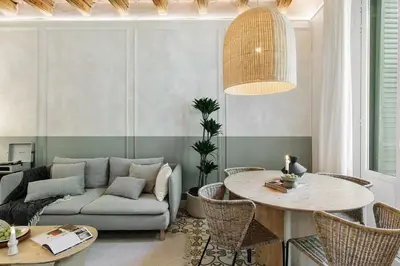 a living room with a couch and a table at Scala - 2 bedrooms in Sant Gervasi in Barcelona