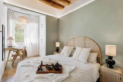 a white bathroom with a sink and a mirror at Scala - 2 bedrooms in Sant Gervasi in Barcelona