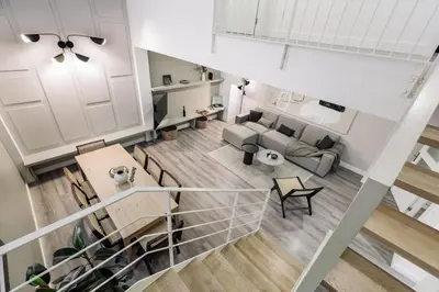 a bathroom with a toilet and a sink and a tub at Marce - 3 bedrooms and a terrace in Les Corts in Barcelona