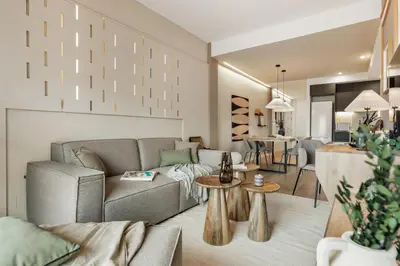 a living room with a table and a couch at Huila - 2 bedrooms and balcony in Les Corts in Barcelona