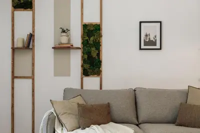 a living room with a table and a couch at Belua - 2 bedrooms in Sarrià in Barcelona