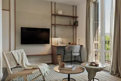a living room with a couch and a table at Alaju - 3 bedrooms and balcony in Les Corts in Barcelona