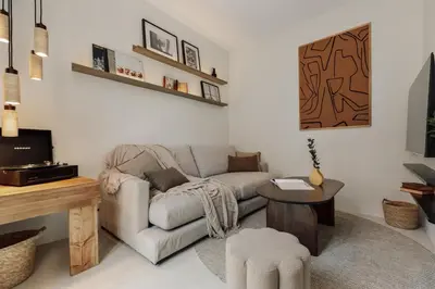 a bedroom with a bed and a desk in a room at Pavona - 2 bedrooms and terrace in Sants in Barcelona