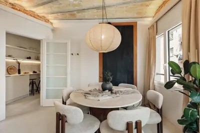 a bedroom with a large bed with a black headboard at Gandoc - 3 bedrooms and terrace in Sants in Barcelona