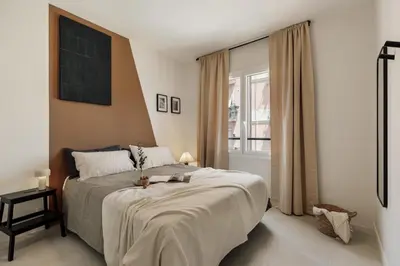 a dining room with a table and chairs at Gandoc - 3 bedrooms and terrace in Sants in Barcelona