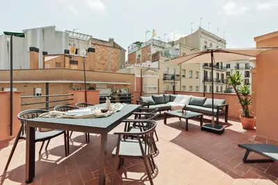 a living room with a table and a large orb at Gandoc - 3 bedrooms and terrace in Sants in Barcelona